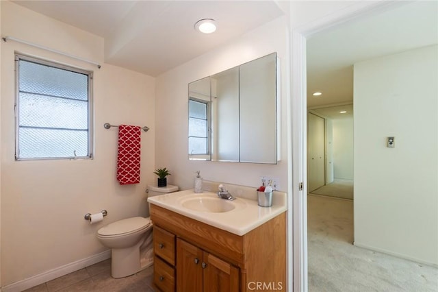23026 Nadine Cir Unit B, Torrance, CA 90505 - bathroom with toilet, baseboards, vanity, and tile patterned flooring
