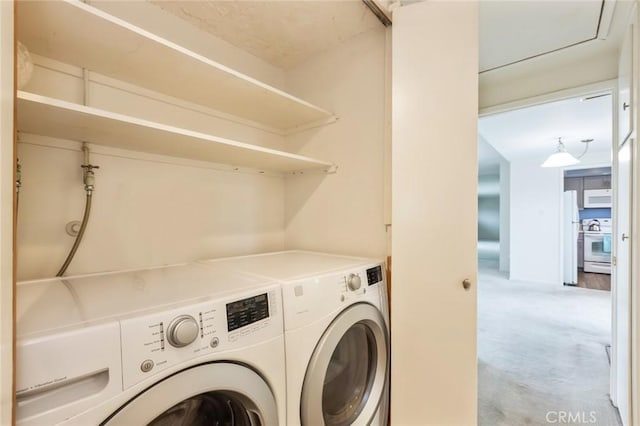23026 Nadine Cir Unit B, Torrance, CA 90505 - washroom with light colored carpet, laundry area, and independent washer and dryer