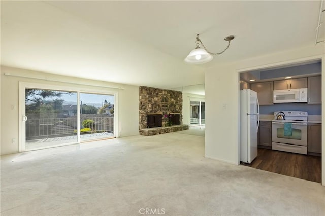 23026 Nadine Cir Unit B, Torrance, CA 90505 - unfurnished living room featuring carpet flooring and a fireplace