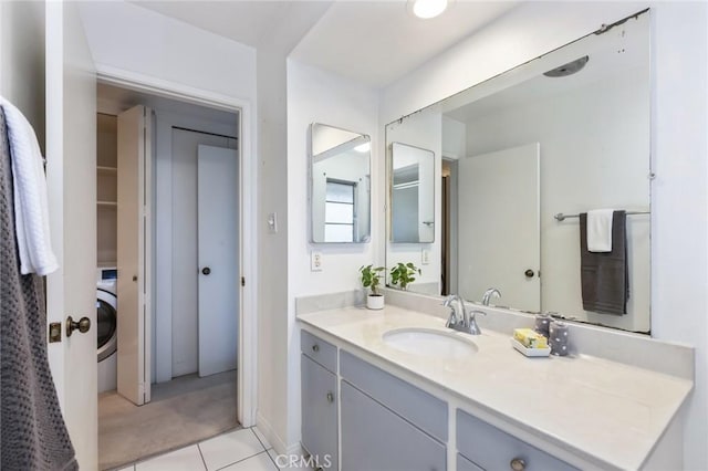23026 Nadine Cir Unit B, Torrance, CA 90505 - bathroom featuring vanity, washer / dryer, and tile patterned floors
