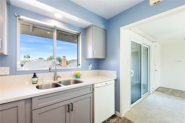 23026 Nadine Cir Unit B, Torrance, CA 90505 - kitchen featuring a sink, gray cabinets, light countertops, and white dishwasher