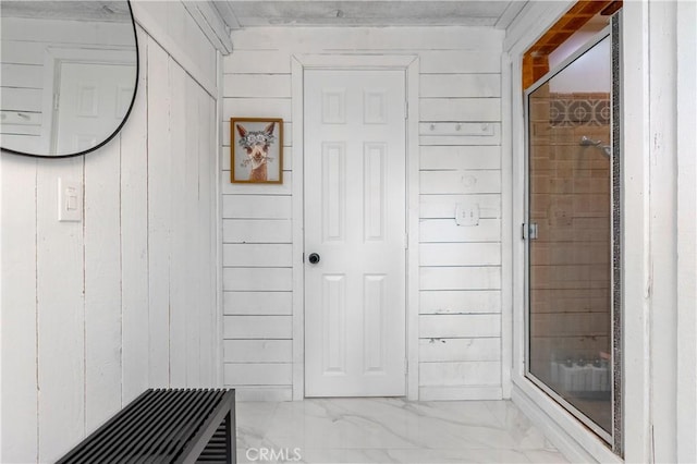 356 Wylerhorn Dr, Crestline, CA 92325 - bathroom featuring wood walls and marble finish floor