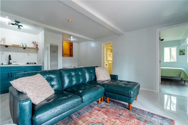 356 Wylerhorn Dr, Crestline, CA 92325 - living room featuring a heating unit, marble finish floor, baseboards, and beamed ceiling