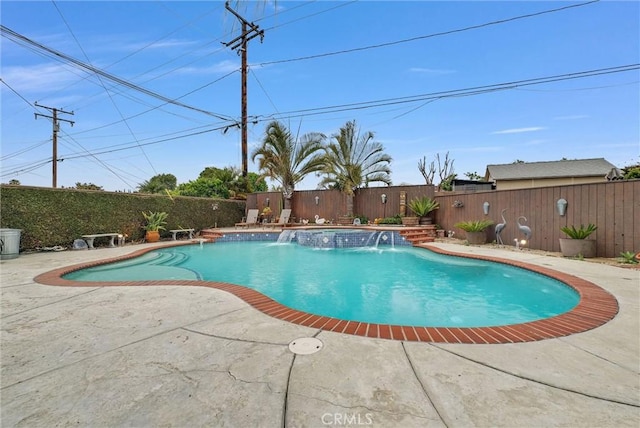 view of pool featuring a patio, a fenced in pool, and a fenced backyard