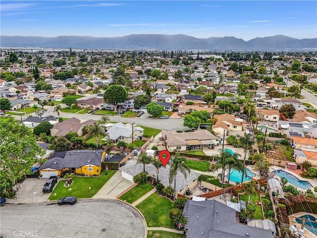 drone / aerial view featuring a mountain view and a residential view