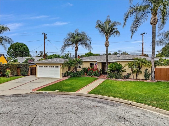 ranch-style house with an attached garage, stucco siding, fence, a front yard, and driveway