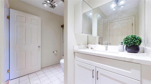 11725 Lemay St Unit 1, North Hollywood, CA 91606 - bathroom featuring toilet, baseboards, tile patterned floors, and vanity