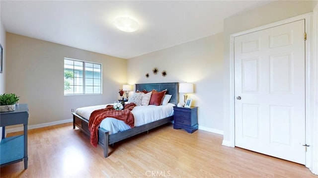 11725 Lemay St Unit 1, North Hollywood, CA 91606 - bedroom with baseboards and light wood finished floors