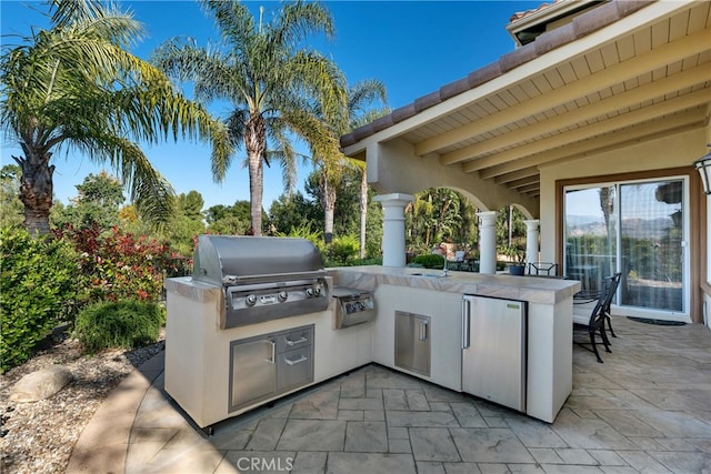 9420 Oak Leaf Dr, Chatsworth, CA 91311 - view of patio / terrace with exterior kitchen and grilling area