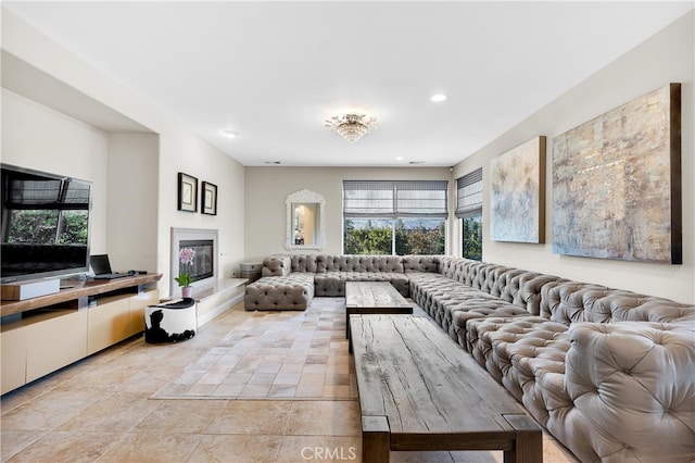 9420 Oak Leaf Dr, Chatsworth, CA 91311 - living room with a glass covered fireplace and recessed lighting