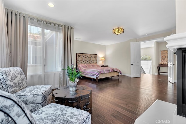 9420 Oak Leaf Dr, Chatsworth, CA 91311 - bedroom with wood finished floors, baseboards, and multiple windows