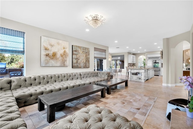 9420 Oak Leaf Dr, Chatsworth, CA 91311 - living area featuring arched walkways, recessed lighting, and light tile patterned flooring