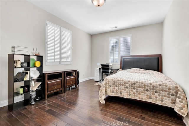 9420 Oak Leaf Dr, Chatsworth, CA 91311 - bedroom with baseboards, dark wood-style floors, and visible vents