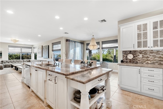9420 Oak Leaf Dr, Chatsworth, CA 91311 - kitchen with recessed lighting, dishwasher, visible vents, a sink, and open shelves