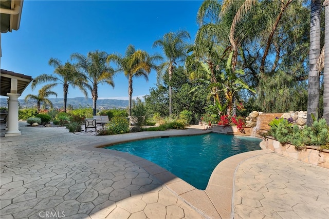 9420 Oak Leaf Dr, Chatsworth, CA 91311 - outdoor pool featuring a patio and a mountain view