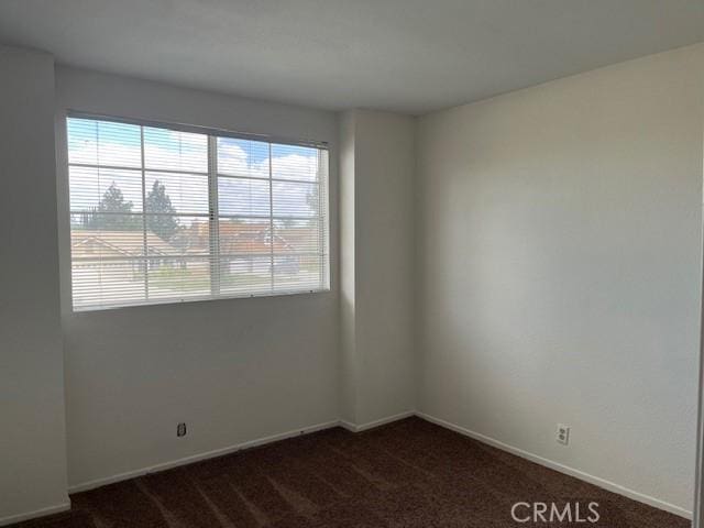 7215 Goldboro Ln, Riverside, CA 92506 - unfurnished room featuring dark carpet and baseboards