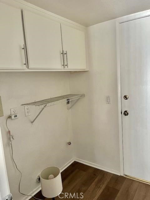 7215 Goldboro Ln, Riverside, CA 92506 - laundry room featuring cabinet space and dark wood-style floors