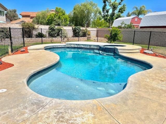 7215 Goldboro Ln, Riverside, CA 92506 - view of pool featuring a pool with connected hot tub and a patio