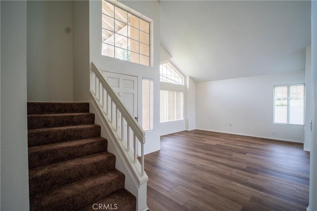 7215 Goldboro Ln, Riverside, CA 92506 - stairway featuring lofted ceiling and wood finished floors