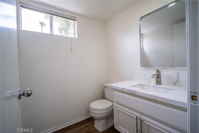 7215 Goldboro Ln, Riverside, CA 92506 - half bath with vanity and wood finished floors