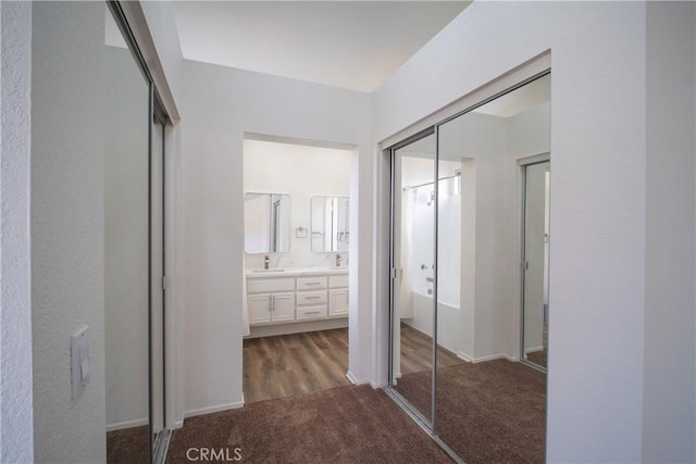 7215 Goldboro Ln, Riverside, CA 92506 - corridor featuring carpet floors and a textured wall