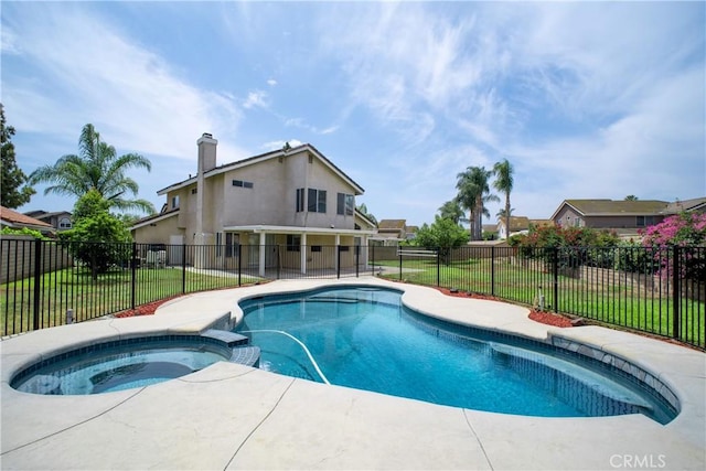 7215 Goldboro Ln, Riverside, CA 92506 - view of swimming pool with a fenced backyard and a pool with connected hot tub