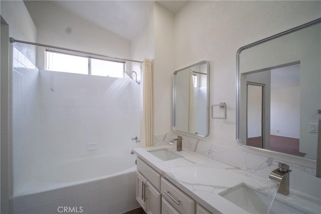 7215 Goldboro Ln, Riverside, CA 92506 - full bath featuring tiled shower / bath combo, lofted ceiling, and double vanity