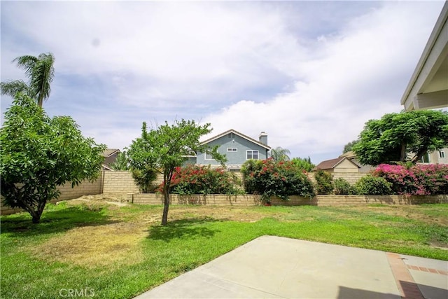 7215 Goldboro Ln, Riverside, CA 92506 - fenced backyard with a patio area