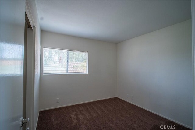 7215 Goldboro Ln, Riverside, CA 92506 - spare room with dark carpet and baseboards