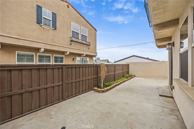 view of patio featuring a fenced backyard