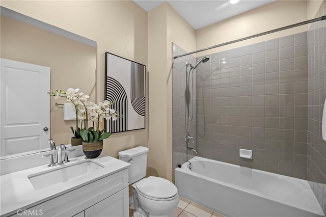 full bathroom with toilet, shower / bathtub combination, vanity, and tile patterned flooring