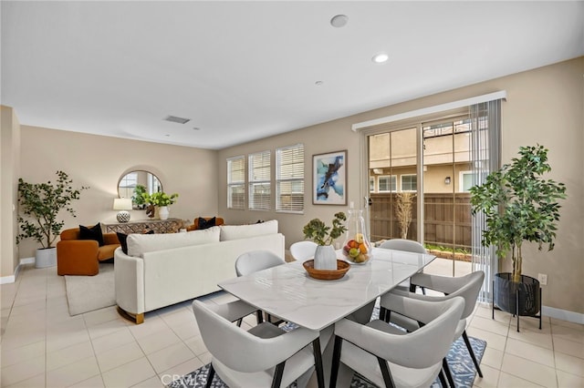dining space with baseboards, recessed lighting, light tile patterned floors, and visible vents
