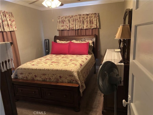 carpeted bedroom with ornamental molding