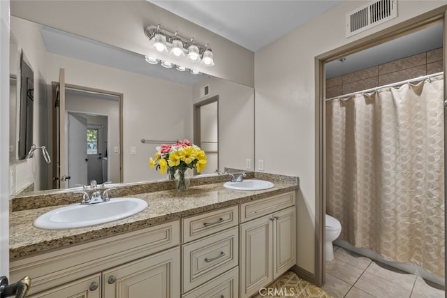 10661 Baton Rouge Ave, Porter Ranch, CA 91326 - full bath with a sink, tile patterned flooring, toilet, and visible vents