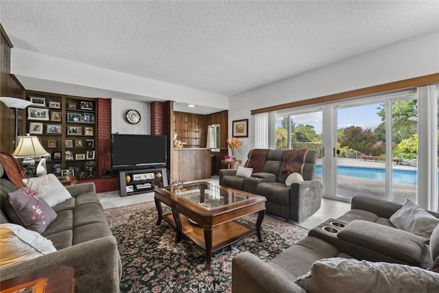 10661 Baton Rouge Ave, Porter Ranch, CA 91326 - living room featuring a textured ceiling