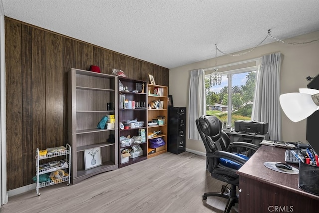 10661 Baton Rouge Ave, Porter Ranch, CA 91326 - office space featuring a textured ceiling, wooden walls, and wood finished floors
