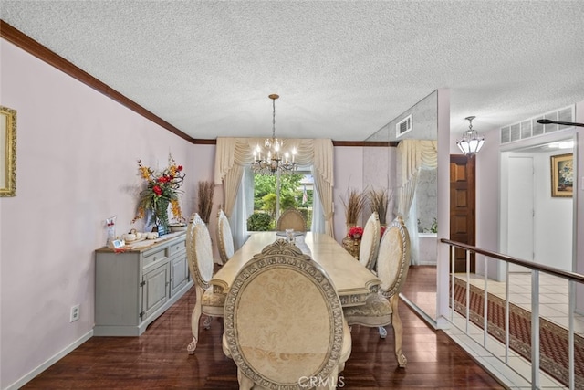 10661 Baton Rouge Ave, Porter Ranch, CA 91326 - dining room with a notable chandelier, a textured ceiling, visible vents, dark wood-style flooring, and ornamental molding