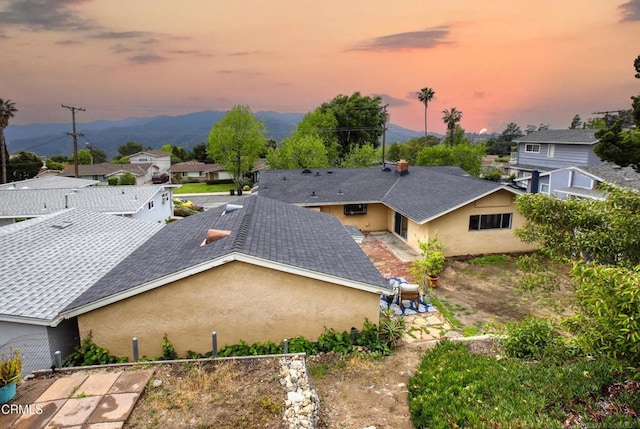 drone / aerial view with a mountain view and a residential view