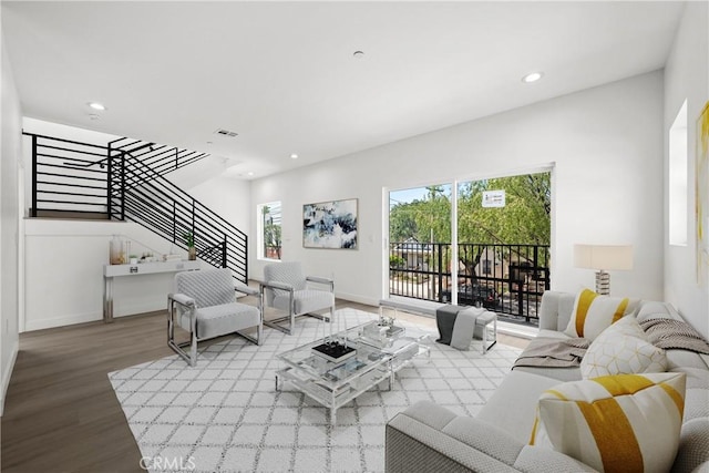 648 N Boyle Ave, Los Angeles, CA 90033 - living area featuring stairway, wood finished floors, baseboards, and recessed lighting