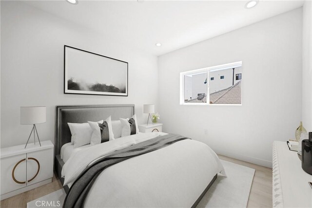 648 N Boyle Ave, Los Angeles, CA 90033 - bedroom featuring wood finished floors, baseboards, and recessed lighting