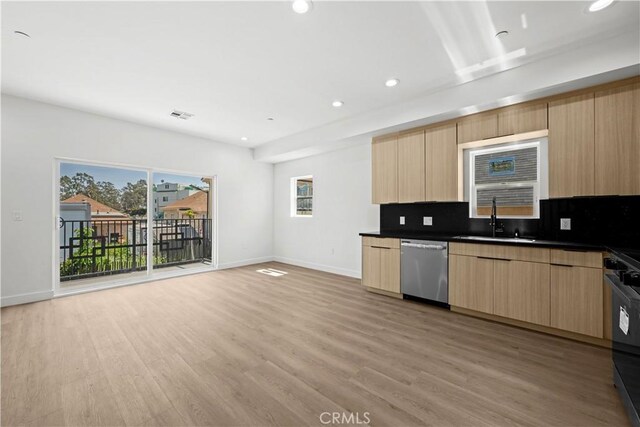 648 N Boyle Ave, Los Angeles, CA 90033 - kitchen with light brown cabinetry, dishwasher, modern cabinets, a sink, and dark countertops