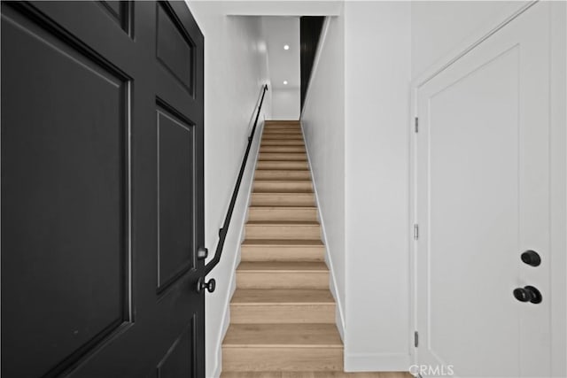 648 N Boyle Ave, Los Angeles, CA 90033 - stairs with baseboards and wood finished floors