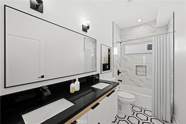 648 N Boyle Ave, Los Angeles, CA 90033 - bathroom with toilet, shower / bath combo with shower curtain, a sink, and double vanity