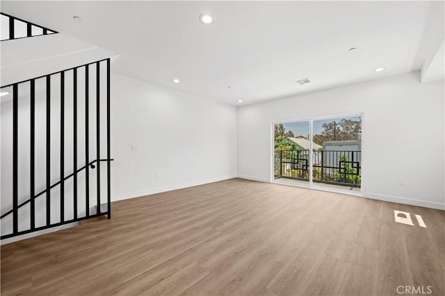 648 N Boyle Ave, Los Angeles, CA 90033 - unfurnished room featuring wood finished floors, baseboards, and recessed lighting