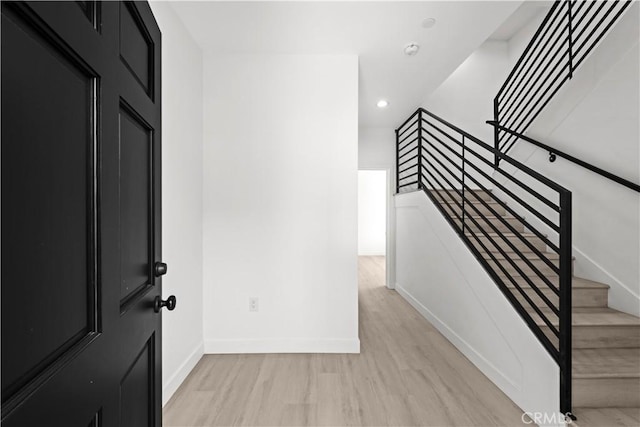 648 N Boyle Ave, Los Angeles, CA 90033 - entrance foyer featuring light wood-style floors, stairway, baseboards, and recessed lighting