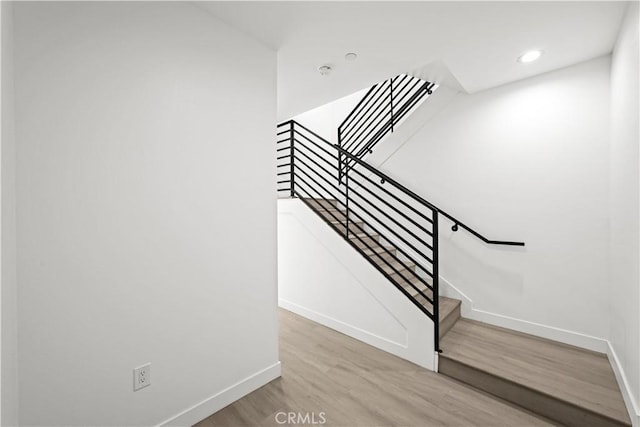 648 N Boyle Ave, Los Angeles, CA 90033 - stairway featuring wood finished floors, baseboards, and recessed lighting