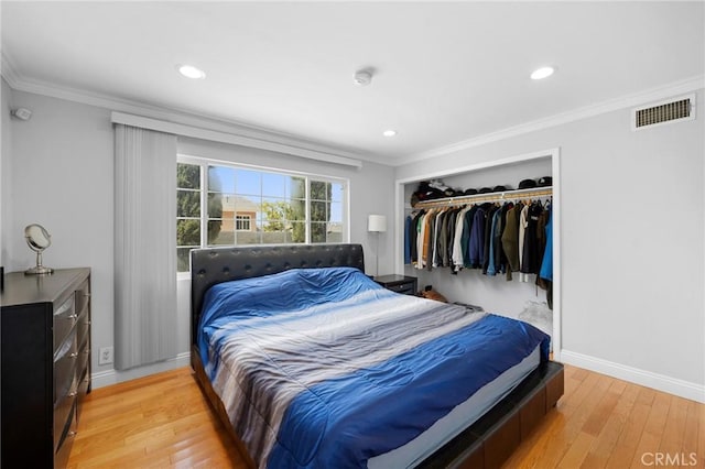 7980 Hollywood Way, Sun Valley, CA 91352 - bedroom with crown molding, light wood-type flooring, and visible vents