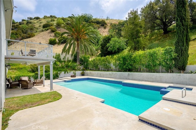 7980 Hollywood Way, Sun Valley, CA 91352 - view of swimming pool with a pool with connected hot tub, a patio, a fenced backyard, ceiling fan, and outdoor lounge area