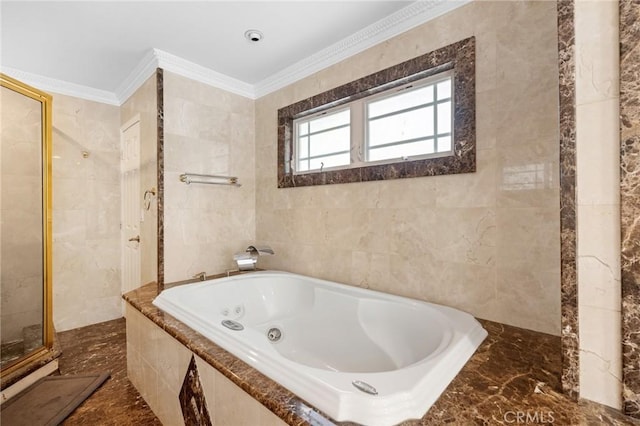 7980 Hollywood Way, Sun Valley, CA 91352 - bathroom featuring a jetted tub, tiled shower, tile walls, marble finish floor, and ornamental molding