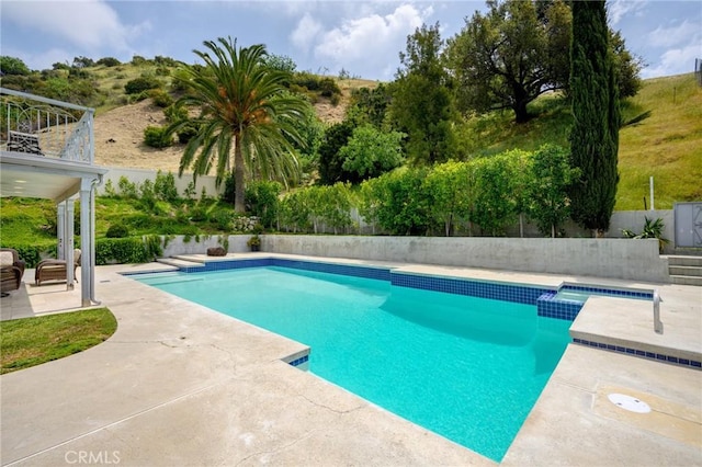 7980 Hollywood Way, Sun Valley, CA 91352 - view of swimming pool with a pool with connected hot tub, a patio, and a fenced backyard
